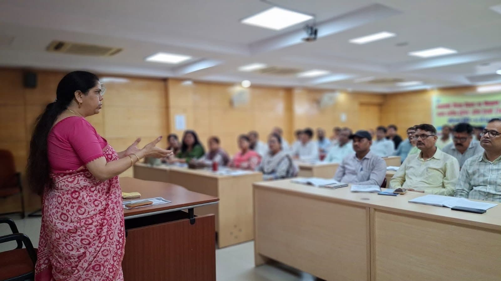 Smt. Amita Dubey of NAB Lucknow leads a training session for teachers in a conference hall